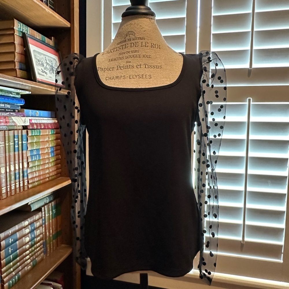 Chic Black Top with Sheer Polka Dot Sleeves